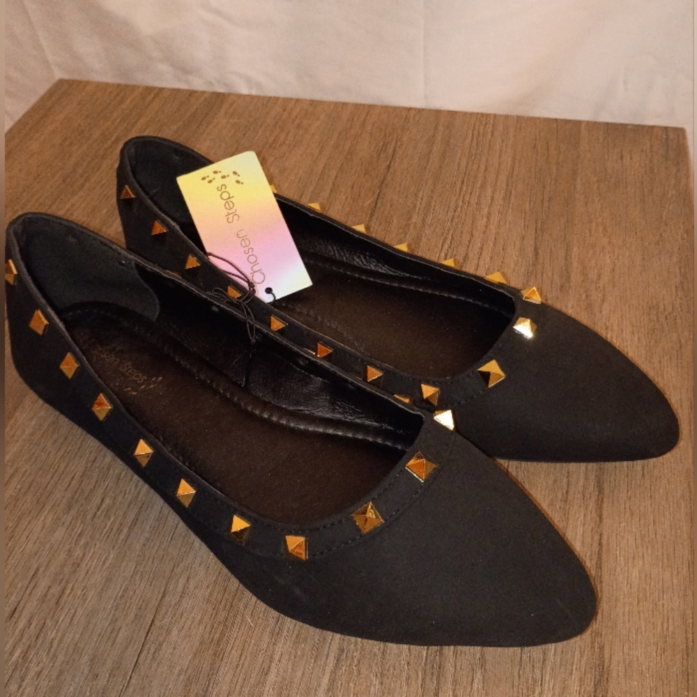 Chic Black Flats with Gold Accents